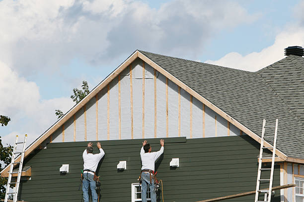 Professional Vinyl Siding technician working in Oakland, MD
